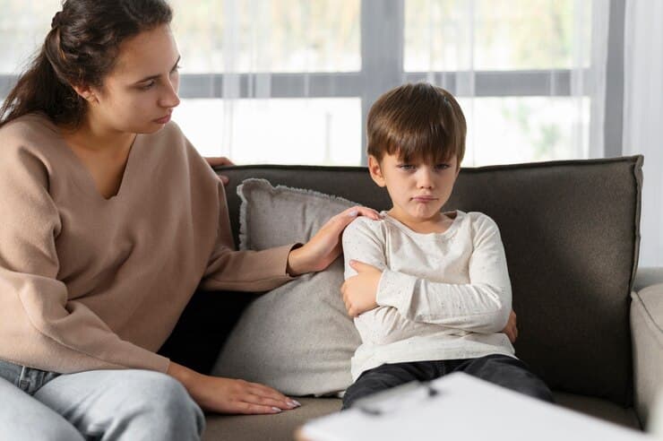 Neurodevelopmental Disorders Parent offering support to a child